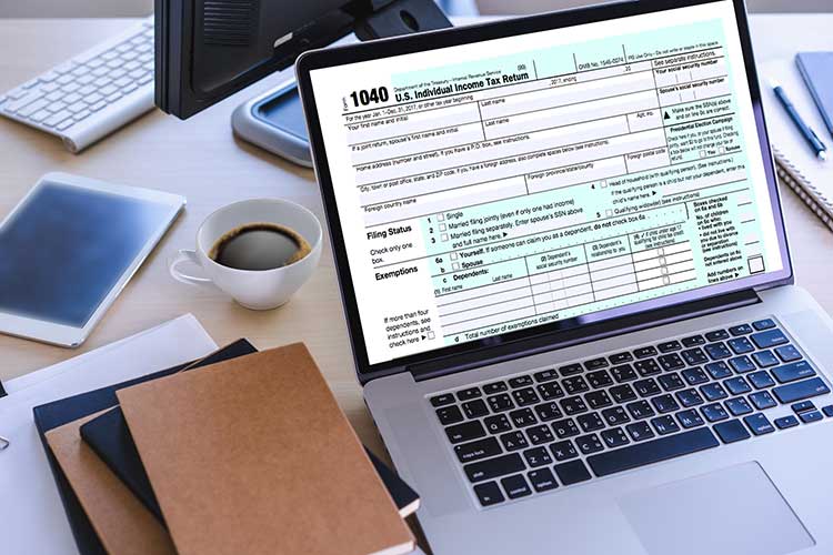 Tax Document on laptop screen 